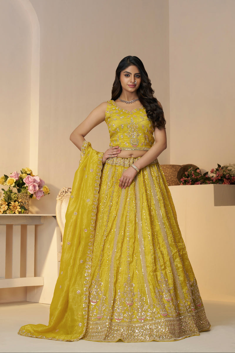 Yellow Jimmy Choo bridal lehenga with stone embellishments