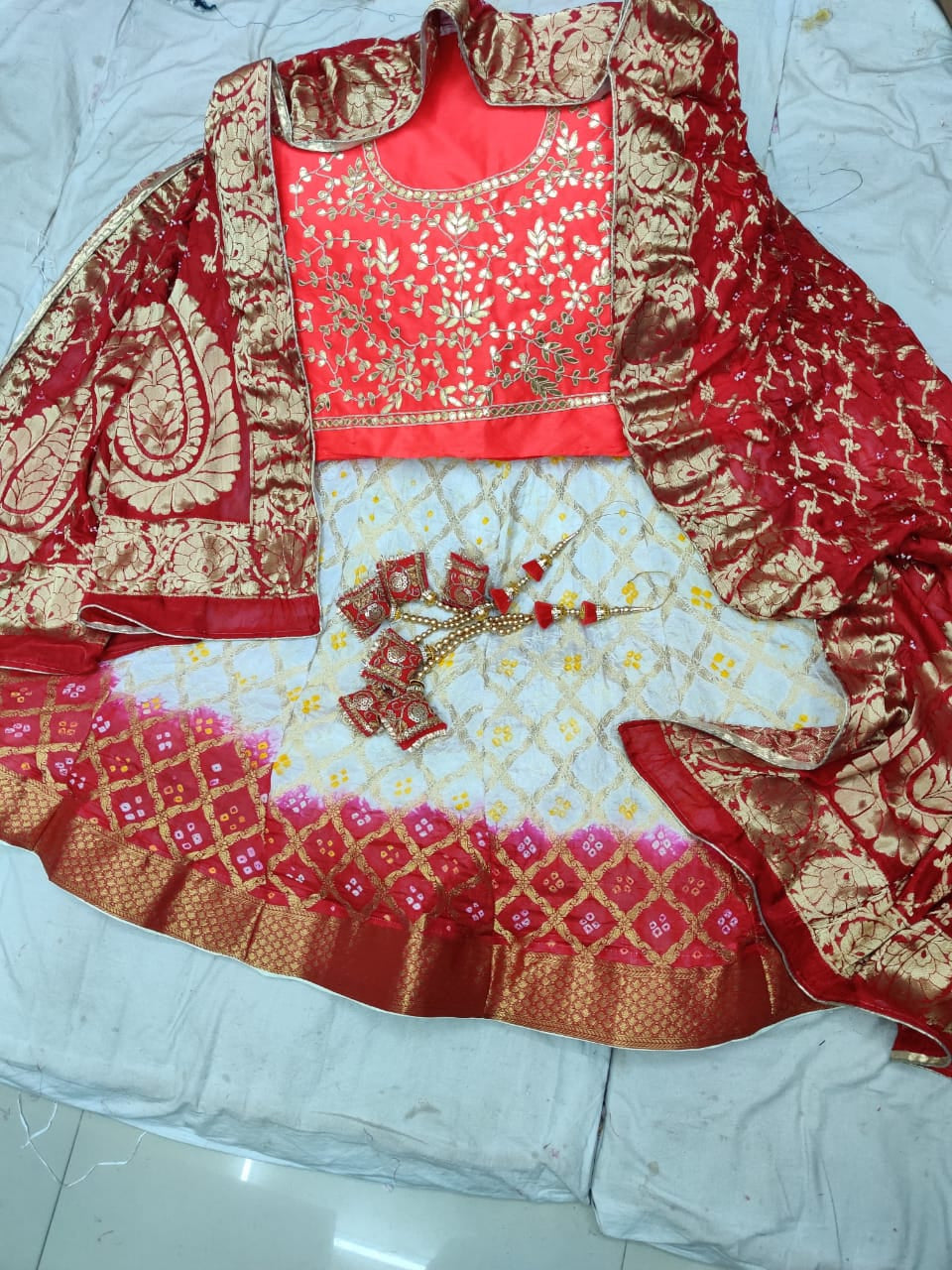 Rajasthani Ghadchola Lahenga Anant Tex Exports Private Limited