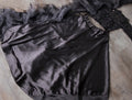 black color organza dupatta with a satin lehenga Anant Tex Exports Private Limited