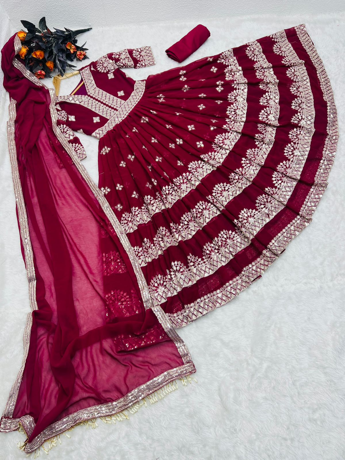 FOX GEORGETTE WITH SEQUENCE EMBROIDERY WORK GOWN Anant Tex Exports Private Limited