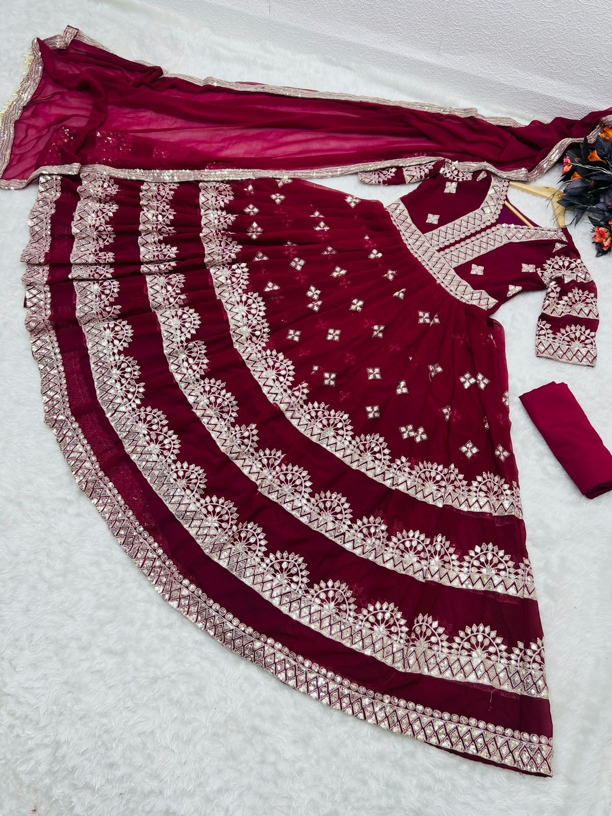 FOX GEORGETTE WITH SEQUENCE EMBROIDERY WORK GOWN Anant Tex Exports Private Limited