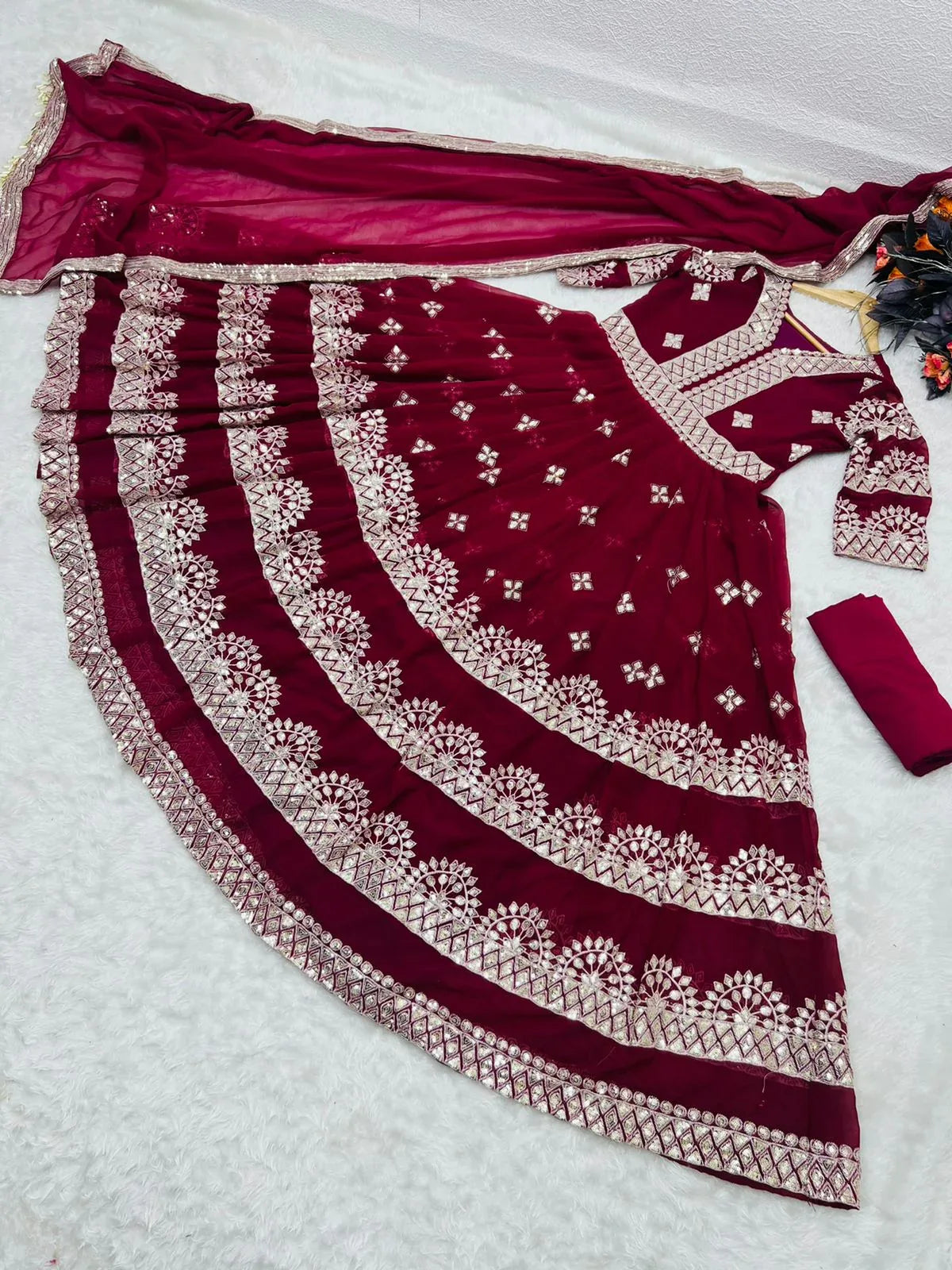 FOX GEORGETTE WITH SEQUENCE EMBROIDERY WORK GOWN Anant Tex Exports Private Limited